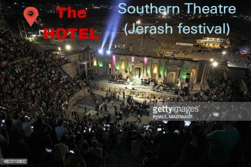 a view of the concert at the southern theatre at night at Panorama Jerash HOTEL (2) in Jerash