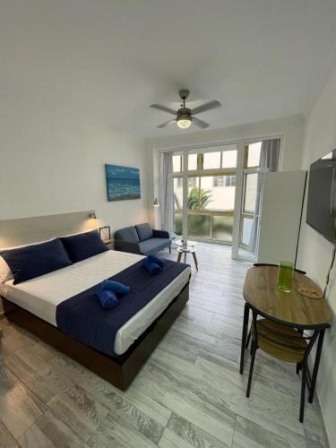 A bed or beds in a room at PALMERAS 102