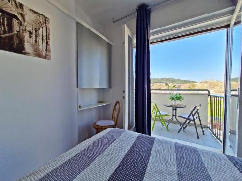 Posteľ alebo postele v izbe v ubytovaní City Star Apartment Split