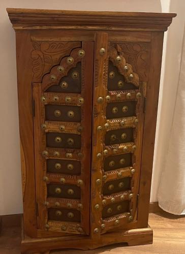 an old wooden cabinet withjar doors at Utopia Luxury Suites - Old Town in Rhodes Town
