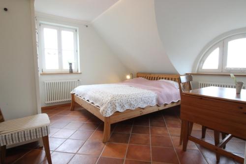 Postel nebo postele na pokoji v ubytování Ferienhaus Leuchtfeuer - Buchungen ab 4 Übernachtungen