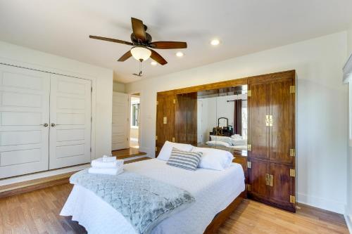 a bedroom with a bed and a ceiling fan at Spacious Prospect Cottage with Deck and Scenic Views in Prospect
