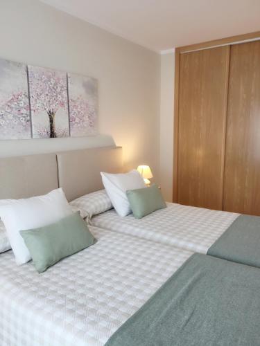 Ένα ή περισσότερα κρεβάτια σε δωμάτιο στο Ribeles Luxury Flat