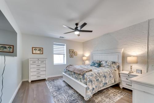 a bedroom with a bed and a ceiling fan at Lenoir Apartment about 30 Mi to Grandfather Mountain in Lenoir