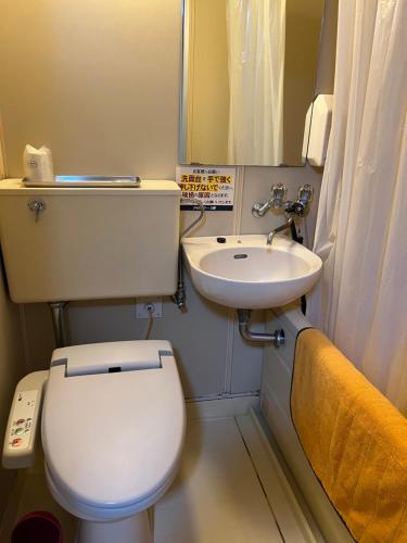 Ванная комната в ナイスイン三原