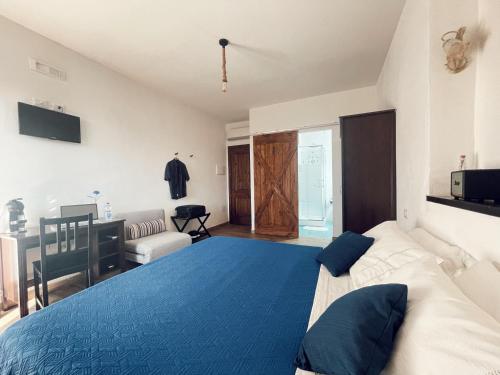 Ένα ή περισσότερα κρεβάτια σε δωμάτιο στο Residenza Cunto