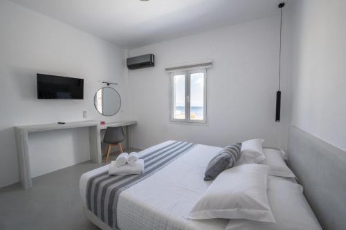 Postel nebo postele na pokoji v ubytování Kamara Sea View Villa