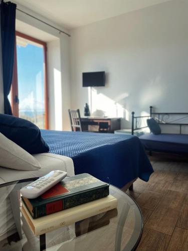 Ένα ή περισσότερα κρεβάτια σε δωμάτιο στο Residenza Cunto
