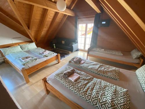 an overhead view of a bedroom with two beds at Sky Apartments in Rust