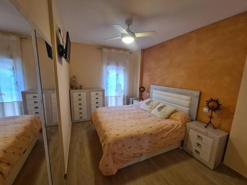 Posteľ alebo postele v izbe v ubytovaní Apartamento cerca del mar