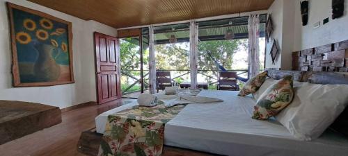 Cama o camas de una habitación en Eco Hotel Aldea -AMAZONAS