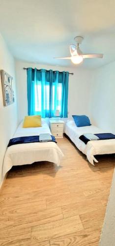 Postel nebo postele na pokoji v ubytování Precioso apartamento en el corazón histórico