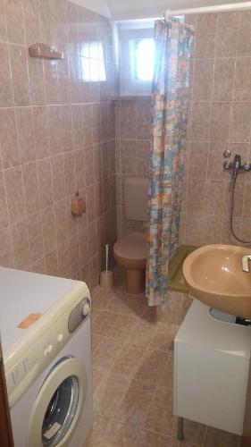 Koupelna v ubytování Apartments Maikidan