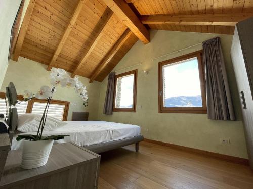 Postel nebo postele na pokoji v ubytování Paradiso del lago x5