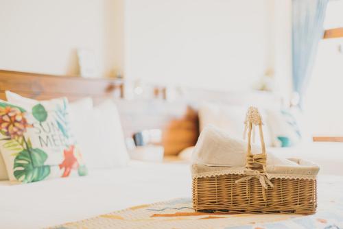Chuanfanrock Haku Beach Days Innにあるベッド