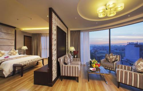 Katil atau katil-katil dalam bilik di Athena Hotel