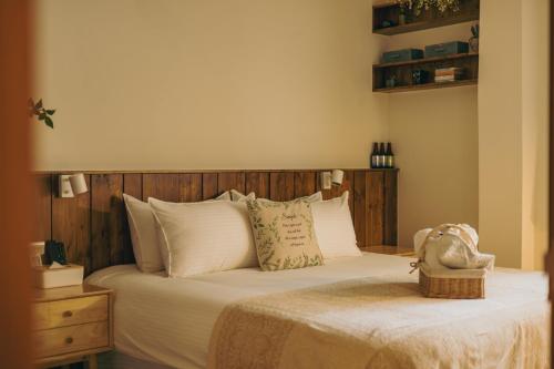 Chuanfanrock Haku Beach Days Innにあるベッド
