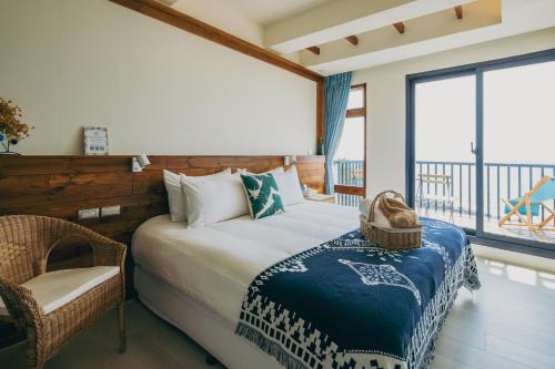 Chuanfanrock Haku Beach Days Innにあるベッド