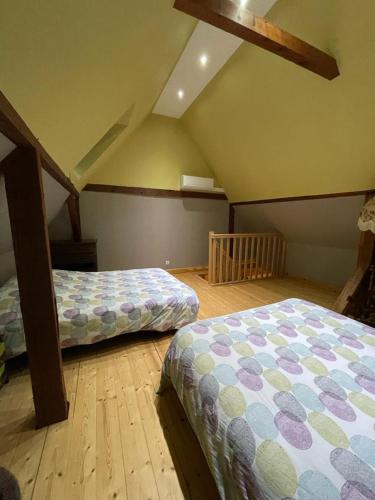 Ένα ή περισσότερα κρεβάτια σε δωμάτιο στο Auberge des Sauterelles