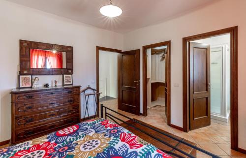 Cama o camas de una habitación en casa vacanze Colonnata