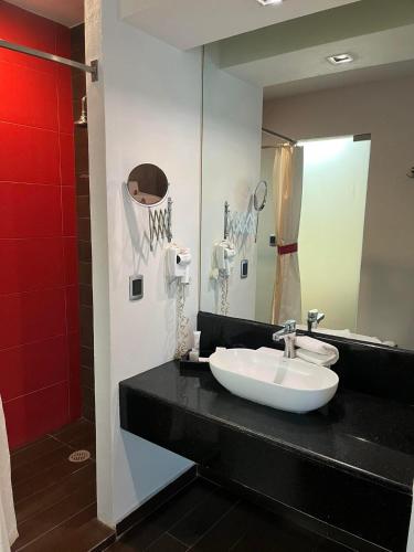 Koupelna v ubytování Zújmú Business Boutique Hotel