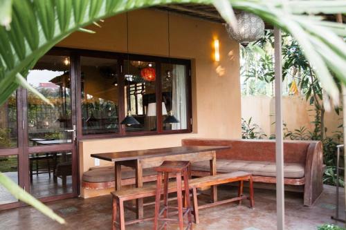 Un restaurante u otro lugar para comer en An Villa boutique resort