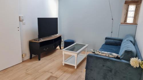 Гостиная зона в Belle suite dans corps de ferme - Logement Alicia
