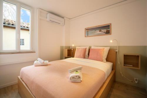 Posteľ alebo postele v izbe v ubytovaní expat renting - Entre Piment & Violette - Saint Michel