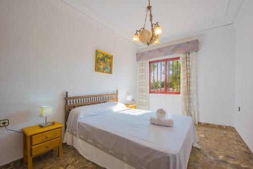 Ένα ή περισσότερα κρεβάτια σε δωμάτιο στο Villa Lina - PlusHolidays
