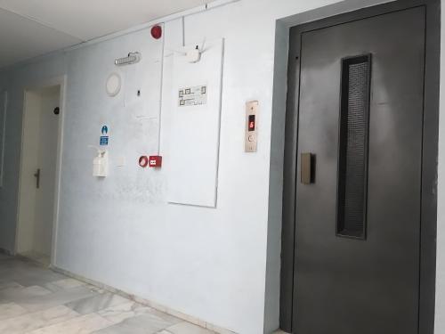 a white wall with a door in a building at La Bella Suit Otel in Kusadası