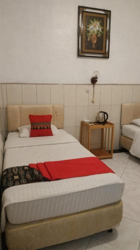 Postel nebo postele na pokoji v ubytování Vina Vira Hotel