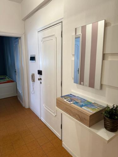 a bathroom with a sink and a mirror on the wall at Casa Natalina in Monterosso al Mare