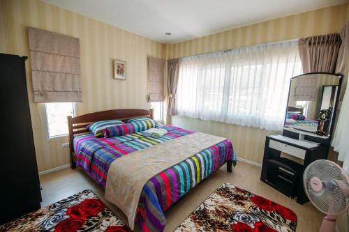 Voodi või voodid majutusasutuse Alexander j Bophut toas