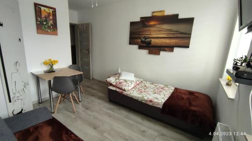 Posteľ alebo postele v izbe v ubytovaní Apartament "Jeleń" Jelenia Góra - Cieplice