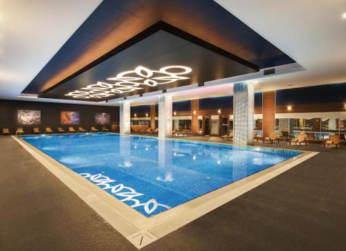 The swimming pool at or close to Ommer Hotel Kayseri