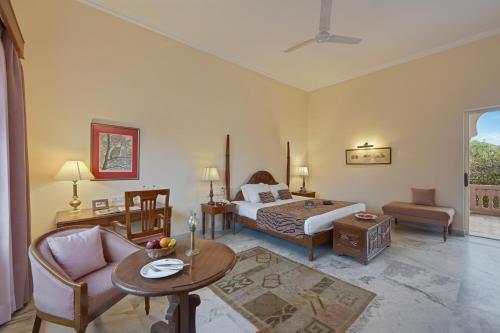 Una cama o camas en una habitación de Dev Vilas