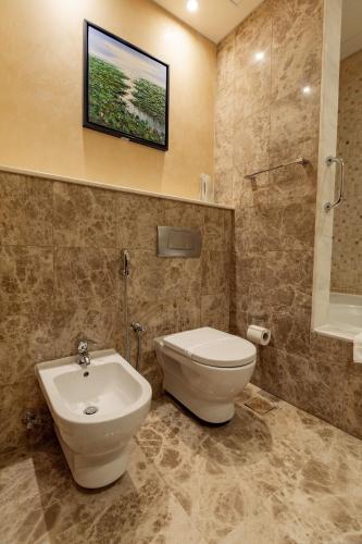  Elite Byblos Hotel -  Room  picture :   Minibar    Shower    Bath                           