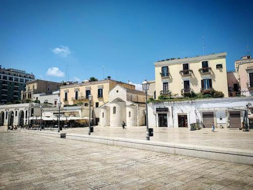 an empty street in a city with buildings at M. Szwed. Guest House old Bari in Bari