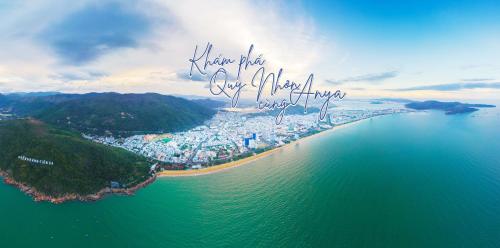 an aerial view of a city and the ocean at Anya Hotel Quy Nhon in Quy Nhon