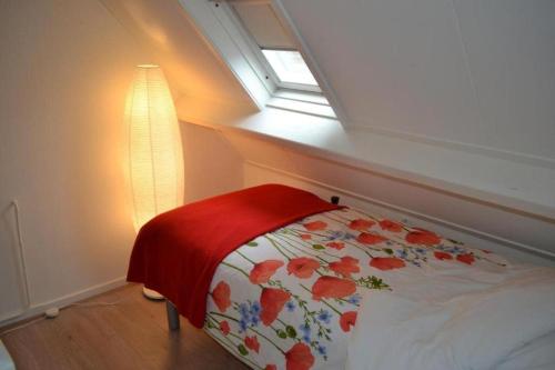 Postel nebo postele na pokoji v ubytování Klaproosje aan zee - Mr. Schoenmakerpad 1