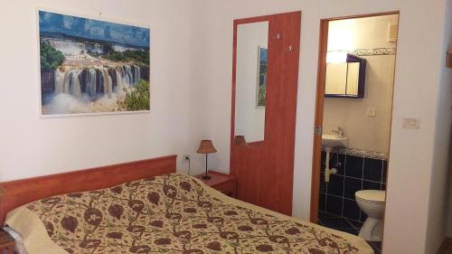 Ένα ή περισσότερα κρεβάτια σε δωμάτιο στο Apartment Kumbaya-Mušalež