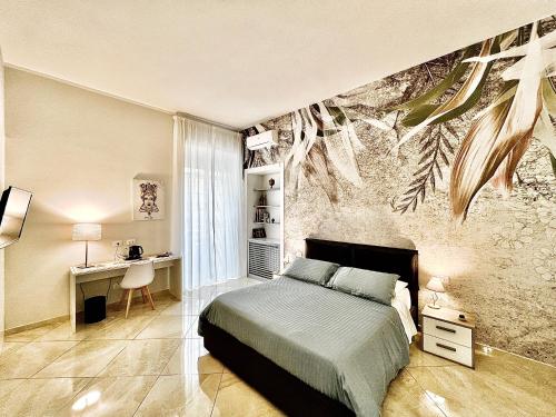 - une chambre avec un lit et un bureau dans l'établissement La Passeggiata di Girgenti, à Agrigente