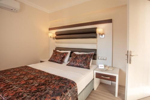 Katil atau katil-katil dalam bilik di Arbatt Marmaris Hotel