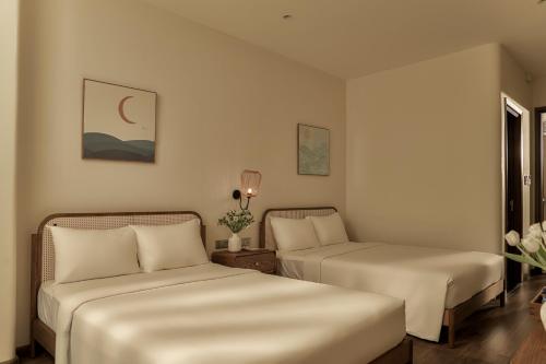 Ένα ή περισσότερα κρεβάτια σε δωμάτιο στο RUBENS BOUTIQUE HOTEL