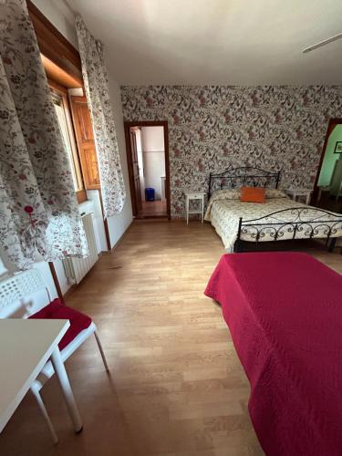 Postel nebo postele na pokoji v ubytování Magione B&B