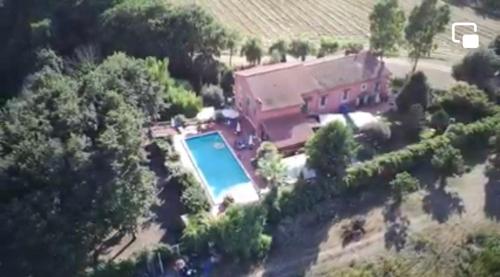 Bazén v ubytování Magione B&B nebo v jeho okolí