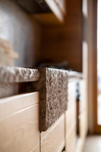 a close up of a row of wooden drawers at Casera Cornolera in Chies dʼAlpago