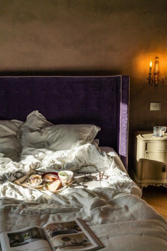 Postel nebo postele na pokoji v ubytování Paragon 700 Boutique Hotel & SPA