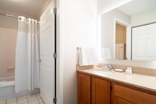 a bathroom with a sink and a shower at Residence Inn Southington in Southington