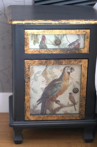 two framed pictures of birds on a table at Château de Crespy & Suites in Crespy-le-Neuf